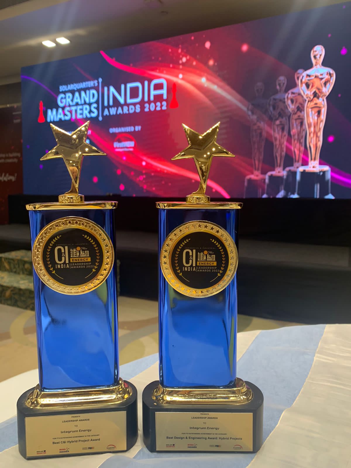 Two SolarQuarter C&I Energy Leadership Awards 2022 trophies received by Integrum Energy